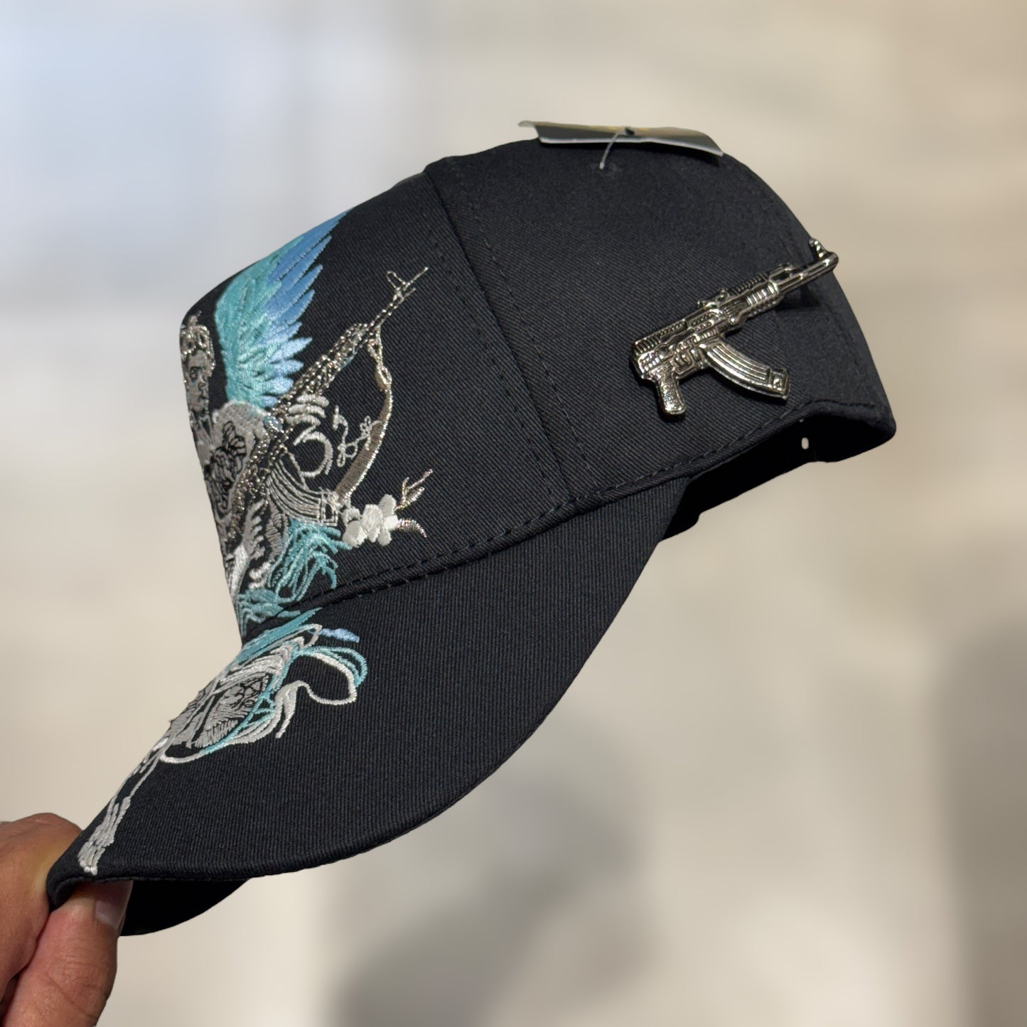 GORRA ANGEL EDICION BELICA CON PIN RIFLE