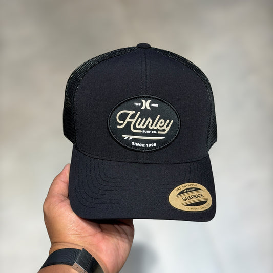 Hurley black cursive font
