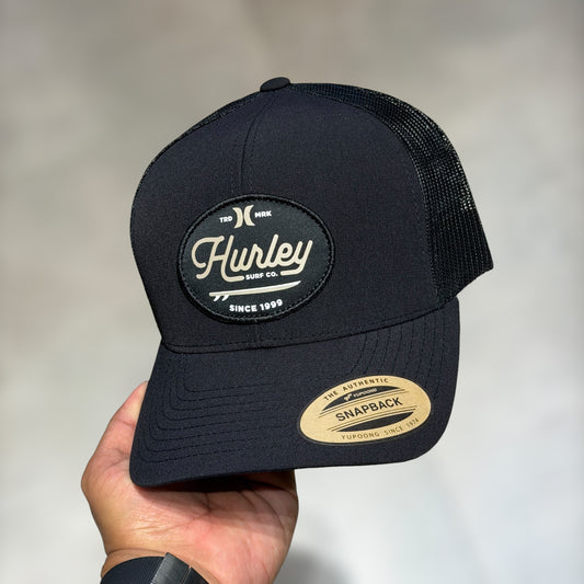 Hurley black cursive font