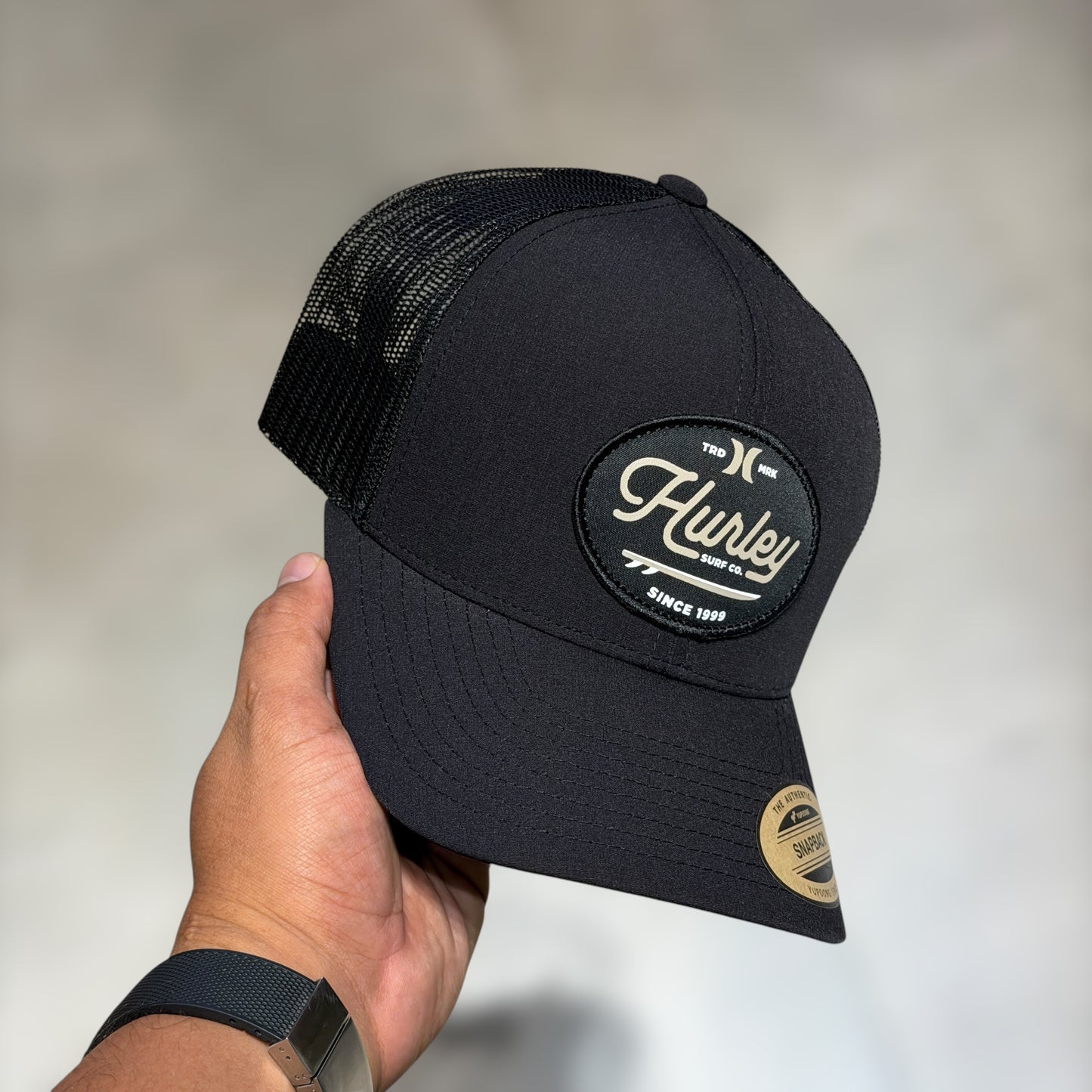 Hurley black cursive font
