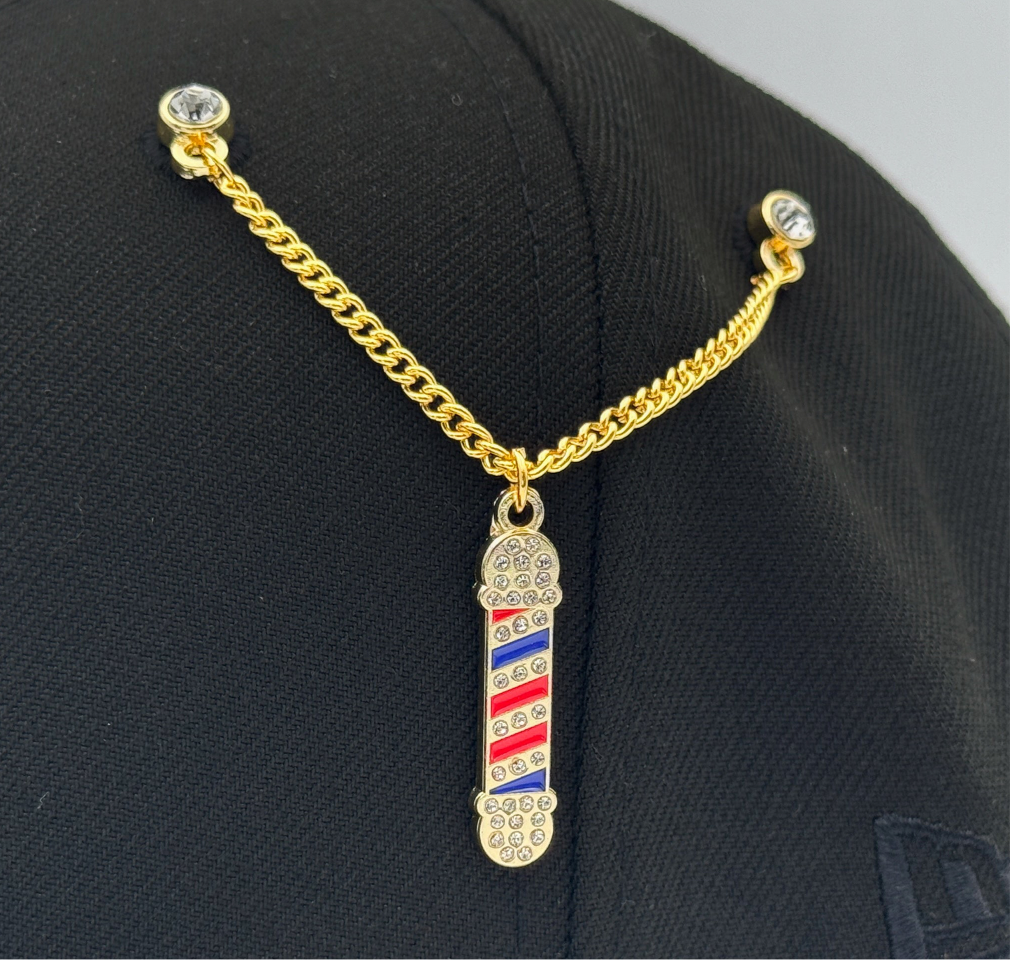 PIN CADENA DORADA BARBER POLE