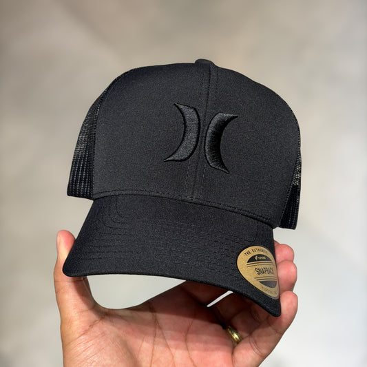 Hurley black on black trucker