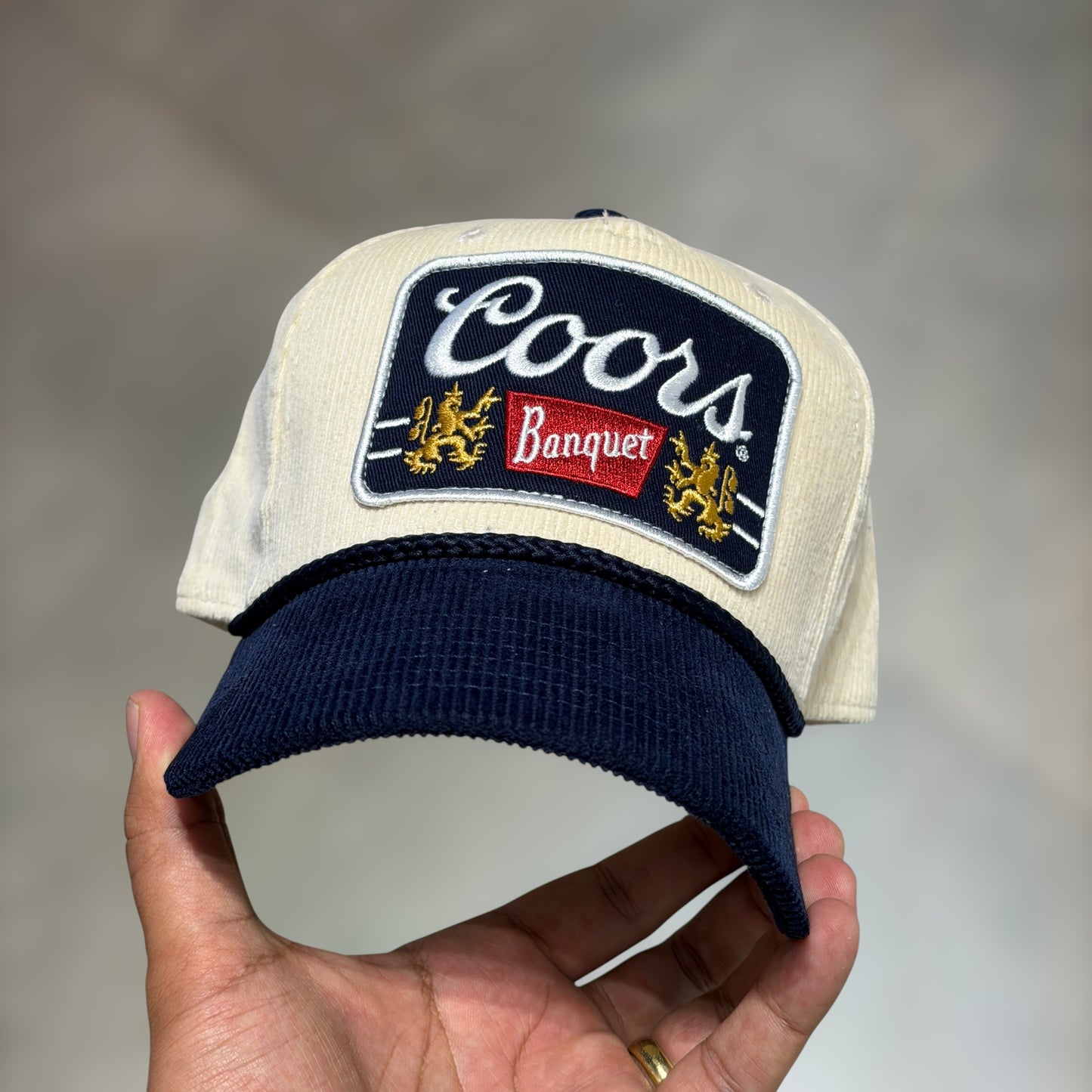Coors Banquet beige Navy brim
